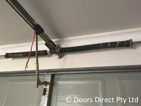 Broken Sectional Garage Door Spring Before